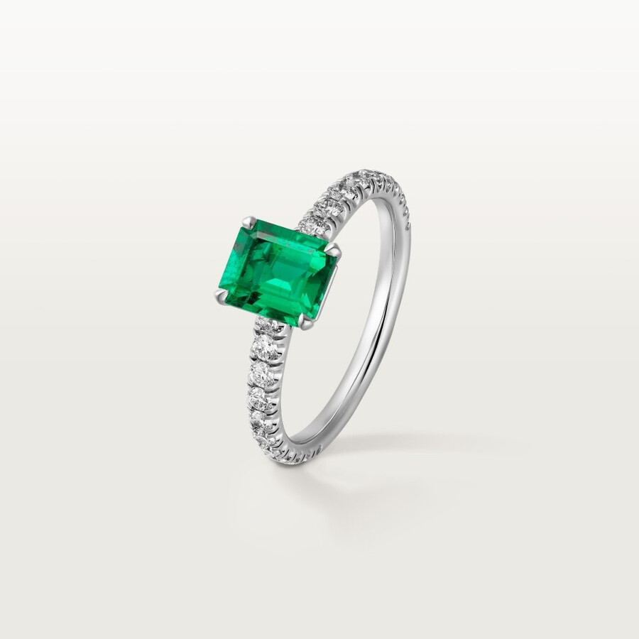 1895 solitaire emerald-cut emerald paved