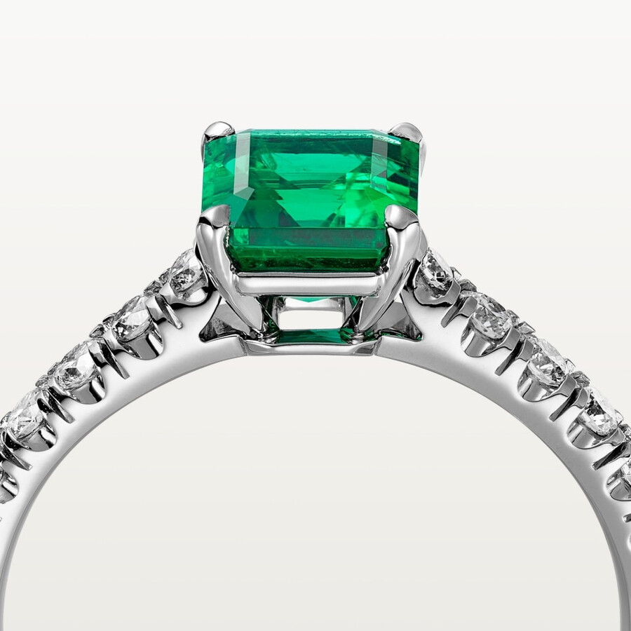 1895 solitaire emerald-cut emerald paved
