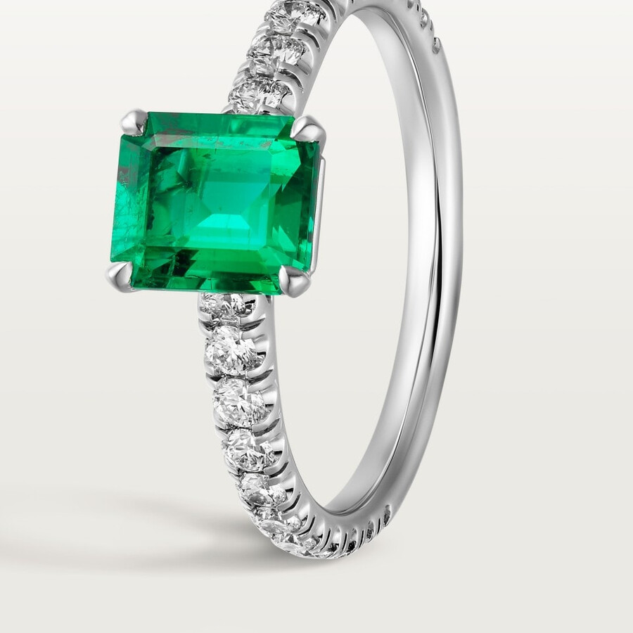 1895 solitaire emerald-cut emerald paved