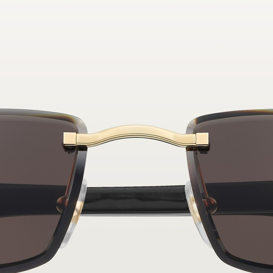 sunglasses with elongated c de cartier motif
